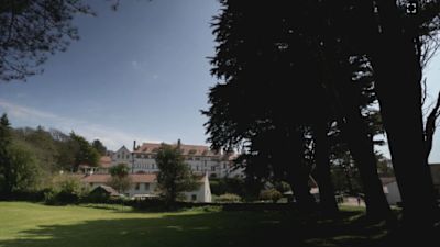 Caldey Island off Pembrokeshire is host to Caldey Abbey.